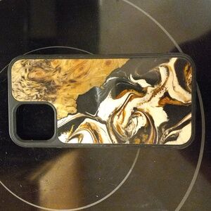 Carved iPhone 12 one of a kind cover.  It's not just protection - it's art.